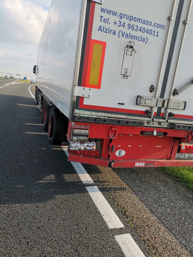 Truck damaged light and bumper